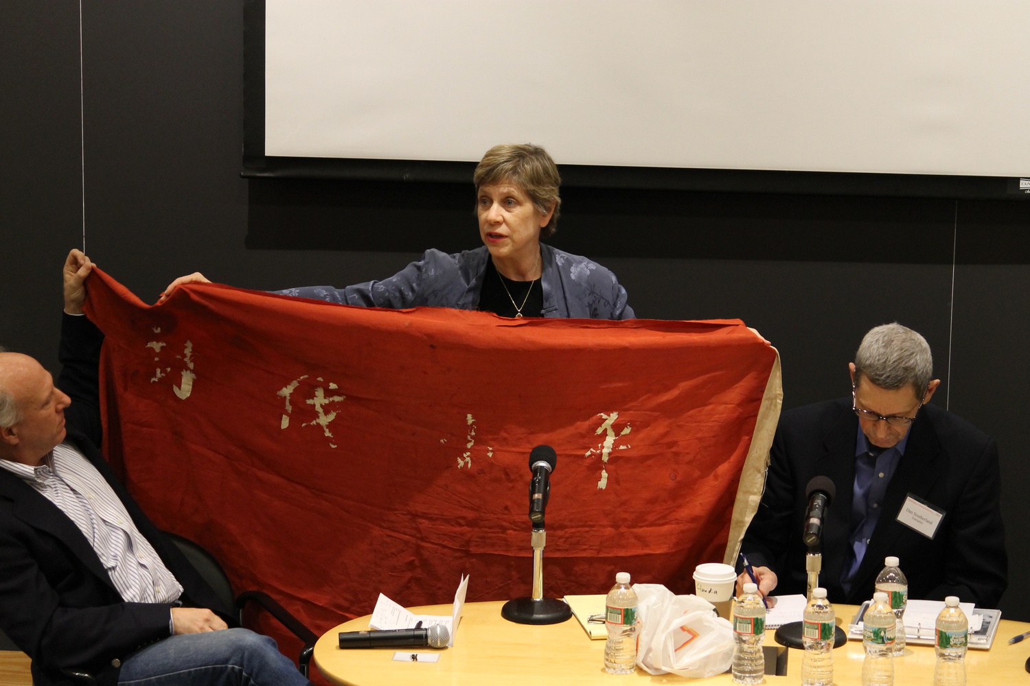 Claudia Rosett, former editorial-page editor of The Asian Wall Street Journal in 1989, shares a banner with the words, "Crusade against Xiaoping" from the 1989 Tiananmen movement. Journalists who were present at the Tiananmen massacres share their emotional experiences in Fong auditorium on the 25th anniversary of Tiananmen Movement.
