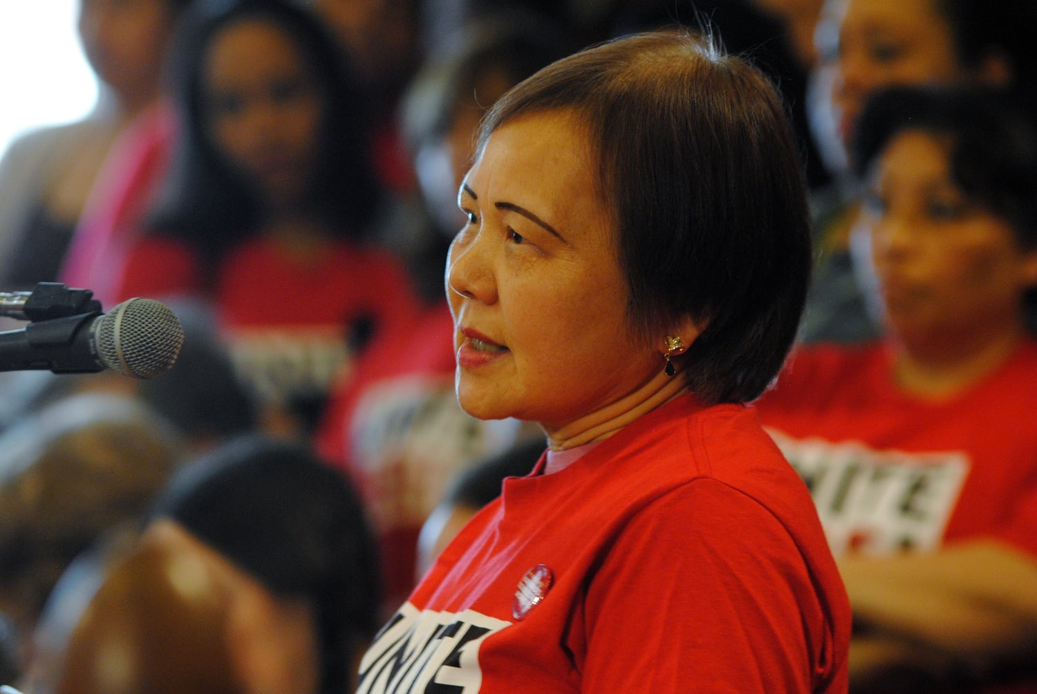 Celia Gee, an employee of the DoubleTree Hotel in Allston, speaks to the Cambridge City Council during a meeting on April 28. As an employee of thirty years, Gee expressed her disappointment in the way that the hotel treats its staff.