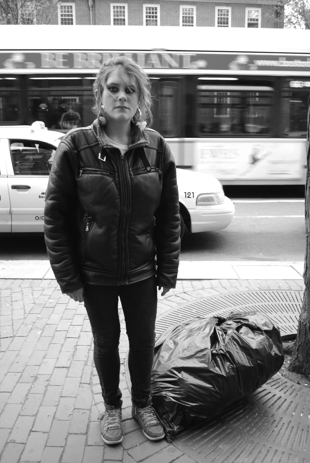 Jade Hosie stops on Mass. Ave. while on her way to CASPAR in Central Square to take a shower. Hosie, a Buffalo native, has lived on the streets of Harvard Square for over 10 months and finds herself depressed by what she has seen. 