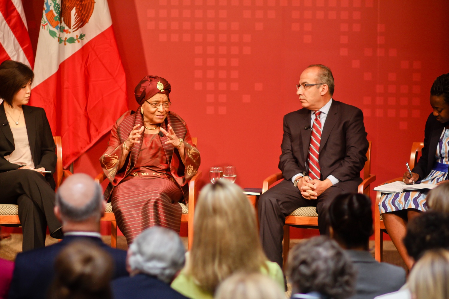 Liberian President Ellen Johnson Sirleaf, second from left, touches on some of the challenges she faces today, as former Mexican President Felipe Calderón looks on during a launch event for the Kennedy School of Government's capital campaign Thursday afternoon.