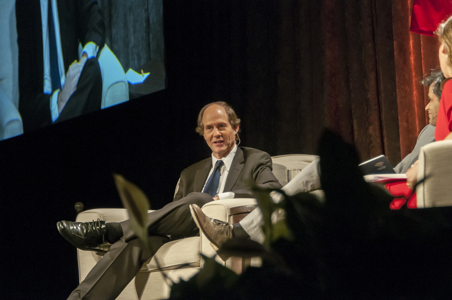 Cass R. Sunstein ‘75 moderates a panel at the Your Harvard: New York event organized by the Harvard Alumni Association on the USS Intrepid in New York City Wednesday.
