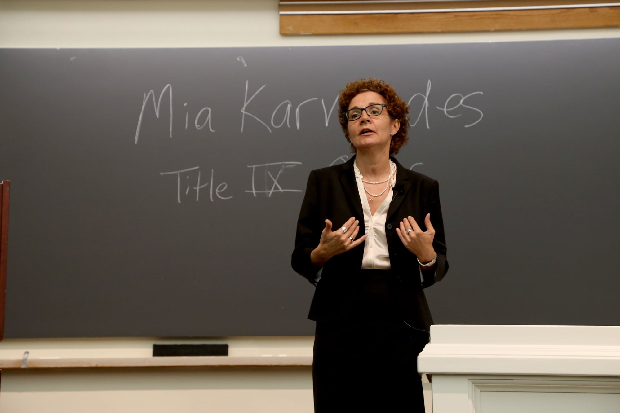 Mia Karvonides, Harvard's Title IX officer, speaks about Harvard's new sexual harassment policy and procedure. The community discussion, held in Emerson Hall, was the first in a series of meetings on the new policy open to Harvard affiliates.