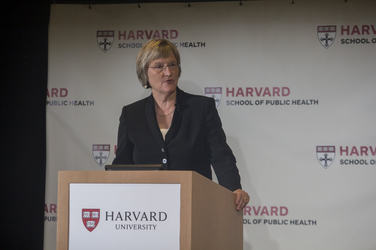 University President Drew G. Faust talks about advances in public health in the past century before introducing Gerald L. Chan at Monday's ceremony at the School of Public Health. 