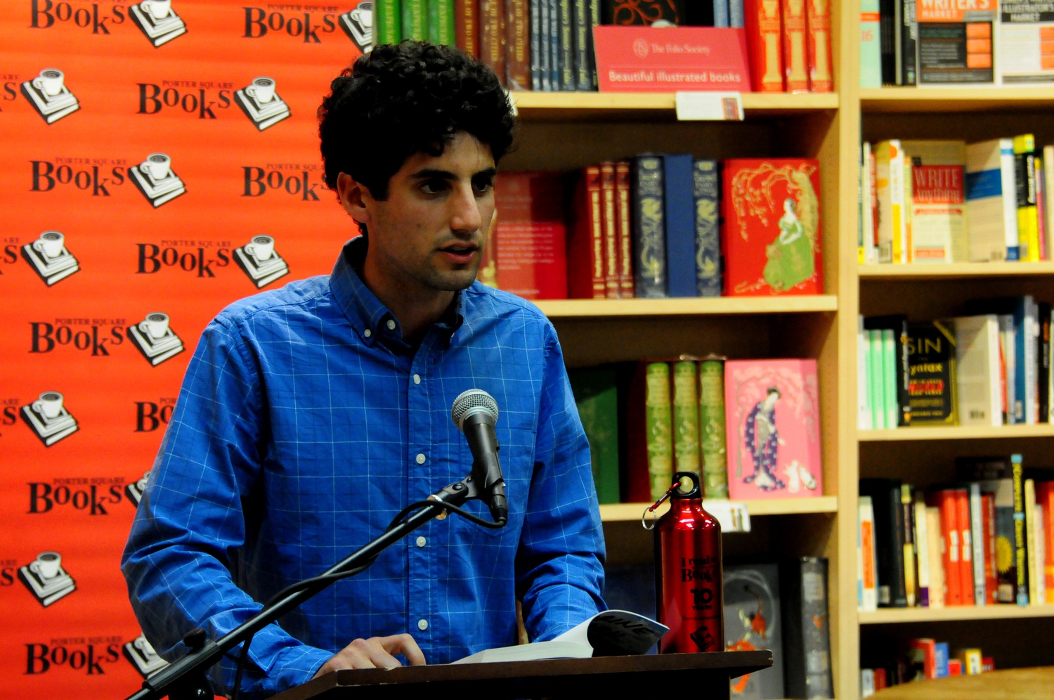 Mark Chiusano '13 discusses his book of short stories, "Marine Park Stories," Tuesday evening at Porter Books. The collection, his first, is based on Chiusano's undergraduate thesis.