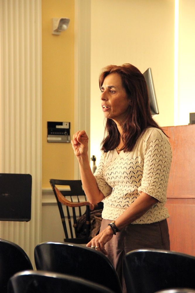 Eleni Bastea, of the University of New Mexico, shares personal anecdotes and poems as part of her lecture on identity and homeland in the Aegean. She spoke Monday afternoon in Harvard Hall.