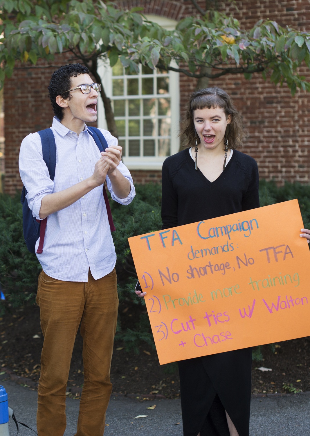 Chanting "education not privatization," Gabriel H. Bayard '15 and Hannah L. McShea '18 protest Teach For America on Friday, Sept. 26 outside Massachusetts Hall.