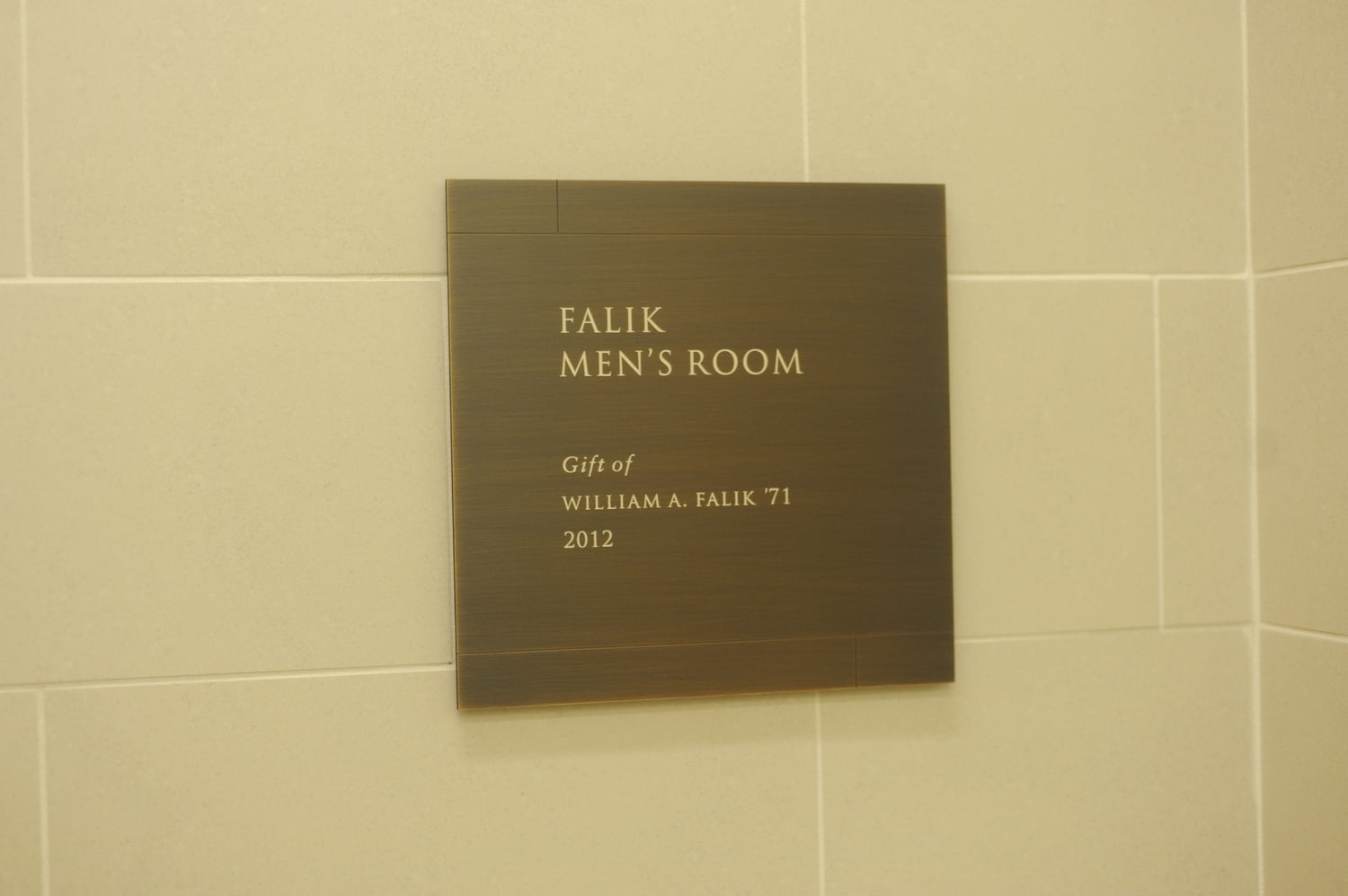 The sign that greets those entering this glorious restroom on the second floor of Harvard Law School's Wasserstein Hall. Harvard Law named the restroom in honor of graduate, William A. Falik '71, who donated $100,000 to establish a fellowship at the School.