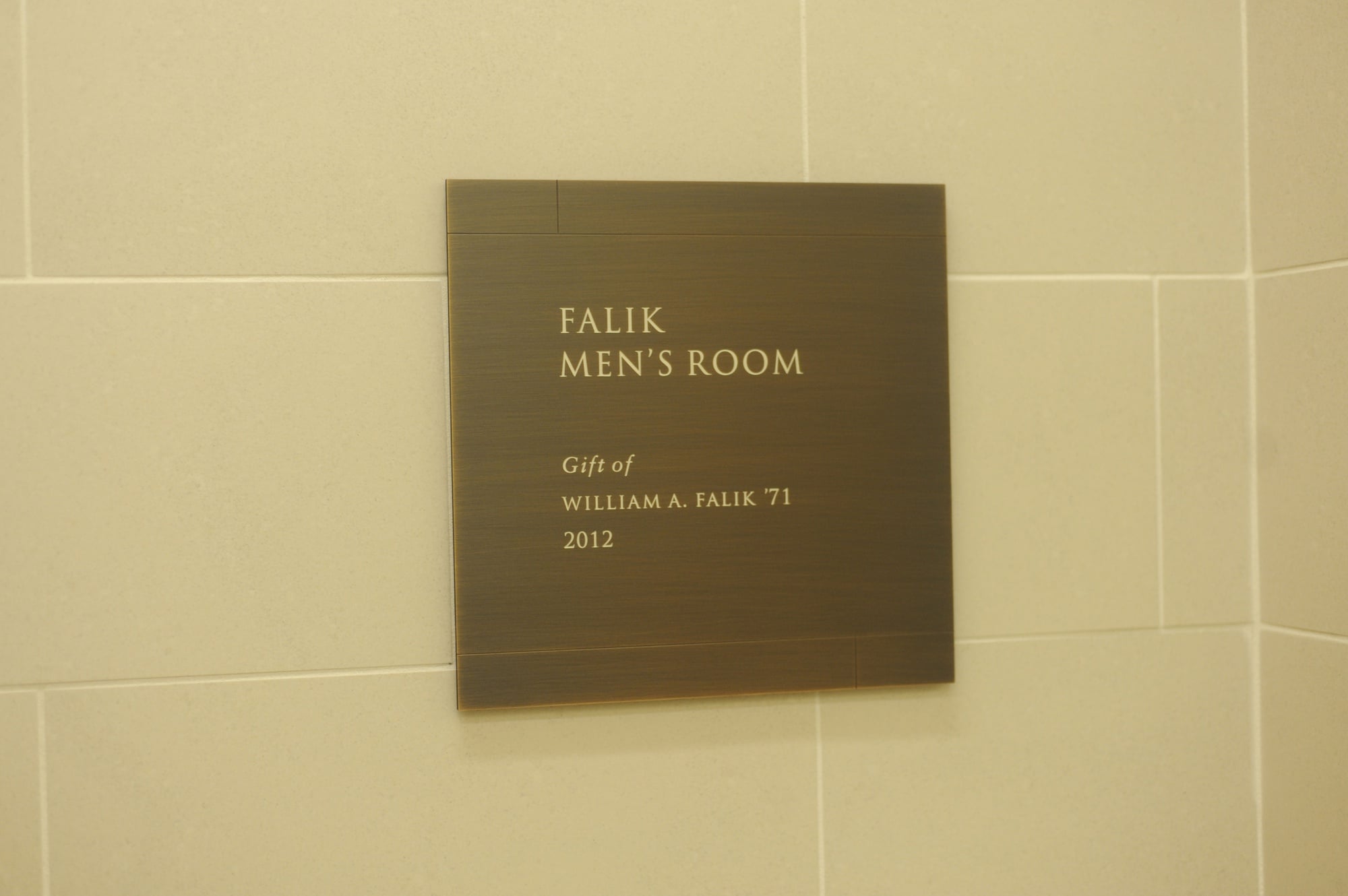 The sign that greets those entering this glorious restroom on the second floor of Harvard Law School's Wasserstein Hall. Harvard Law named the restroom in honor of graduate, William A. Falik '71, who donated $100,000 to establish a fellowship at the School.