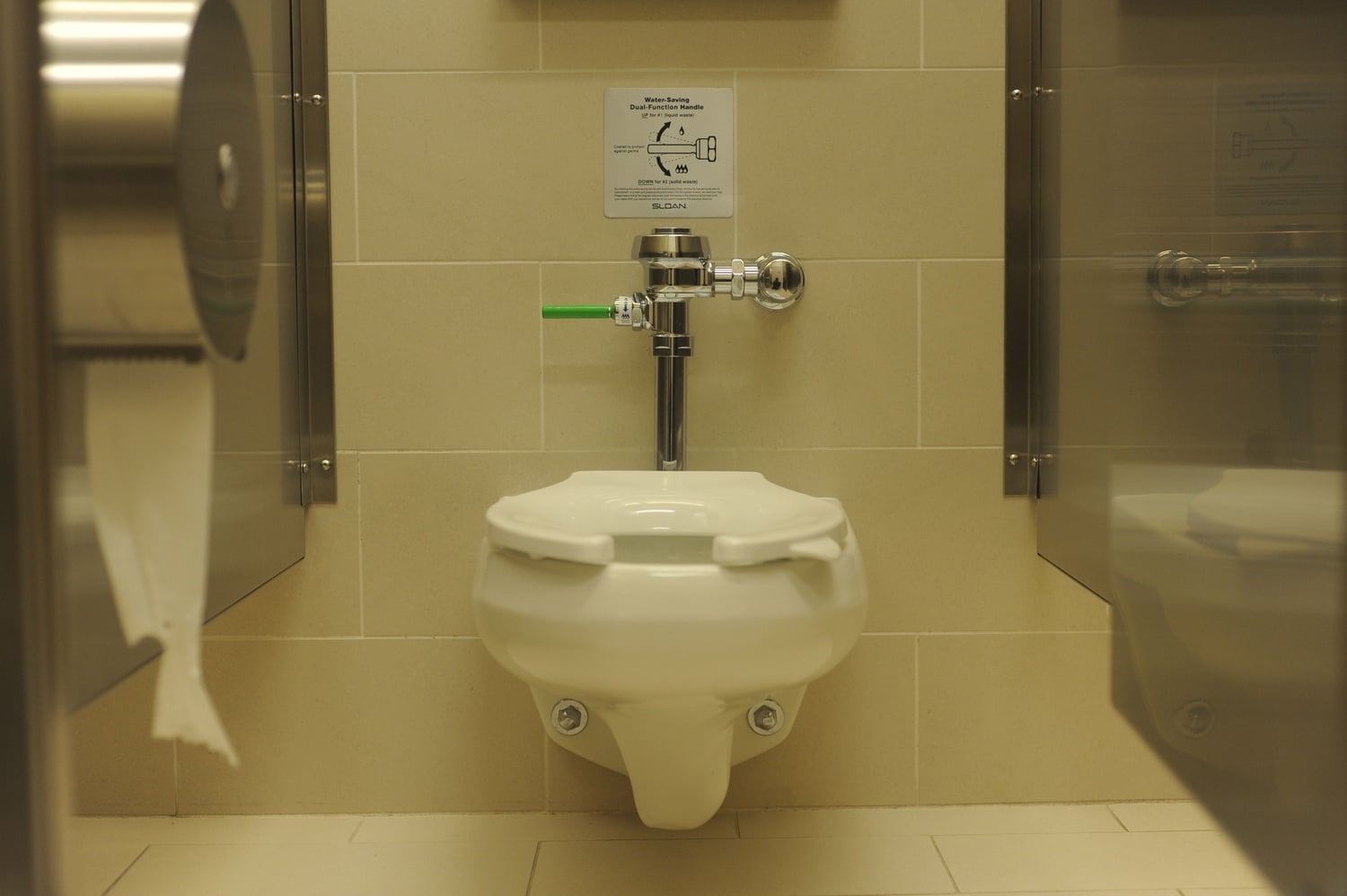 One of the fine toilets of the Falik Men's Room on the 2nd Floor of Harvard Law School's Wasserstein Hall, featuring a Sloan dual flush handle that illustrates the School's commitment to the environment. Harvard Law named the restroom in honor of graduate, William A. Falik '71, who donated $100,000 to establish a fellowship at the School.