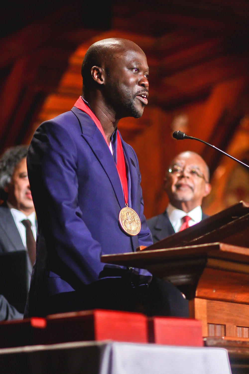 Architect David Adjaye accepts a W.E.B. Du Bois Medal in Sanders theater on Tuesday afternoon.