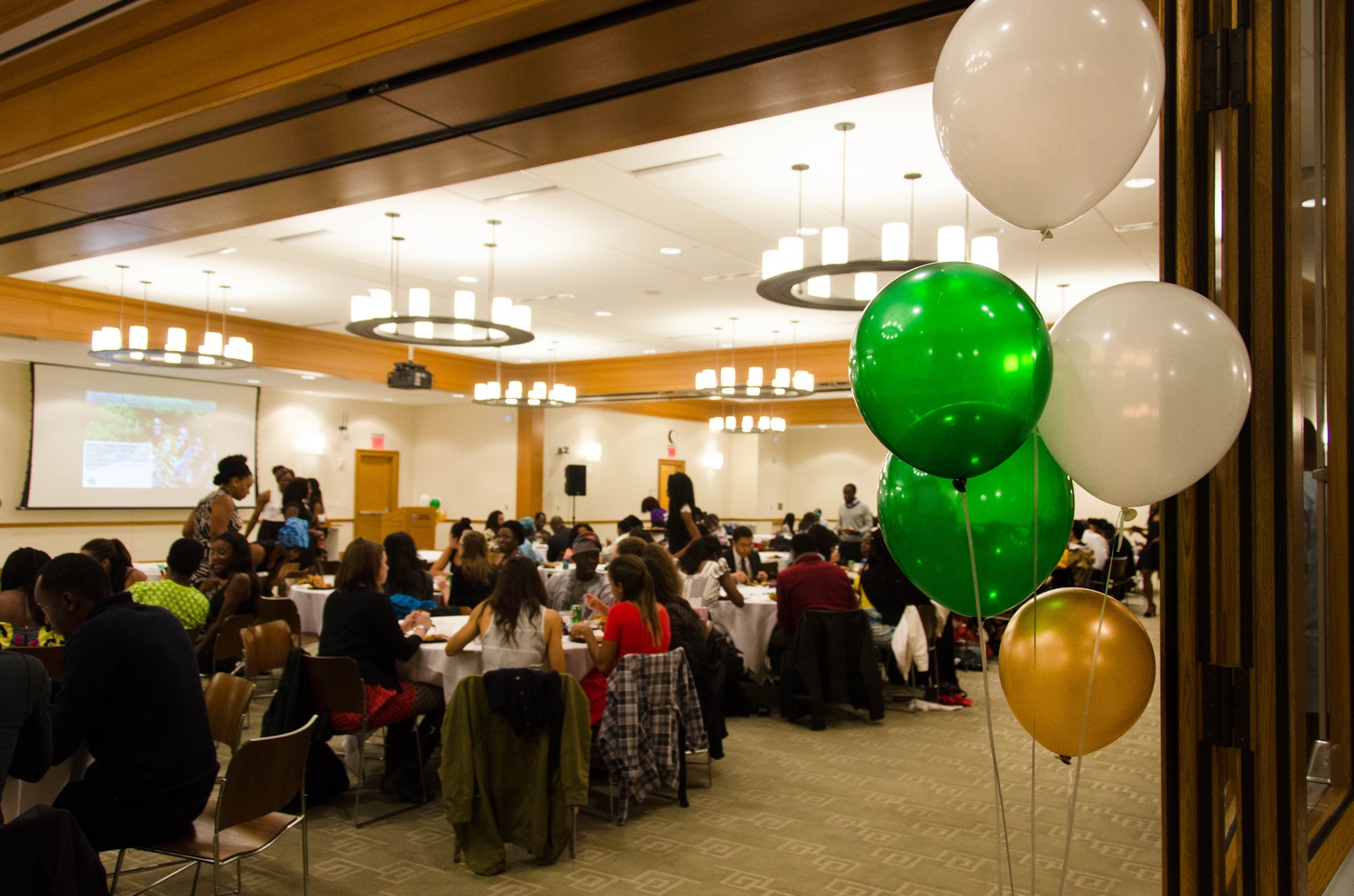 At the fifth Annual Nigerian Independence Day held in Wasserstein Hall in Harvard Law School on Oct. 5, 2014, the colors of the Nigerian flag (as well as celebratory gold) adorned the venue in the form of balloons. The evening featured traditional song, dance, and food.