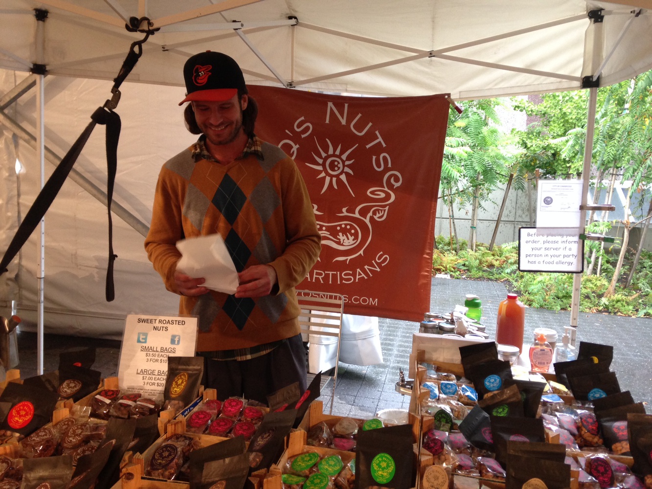 Eric Q. Doyle sells nuts at the Harvard Farmer's Market.