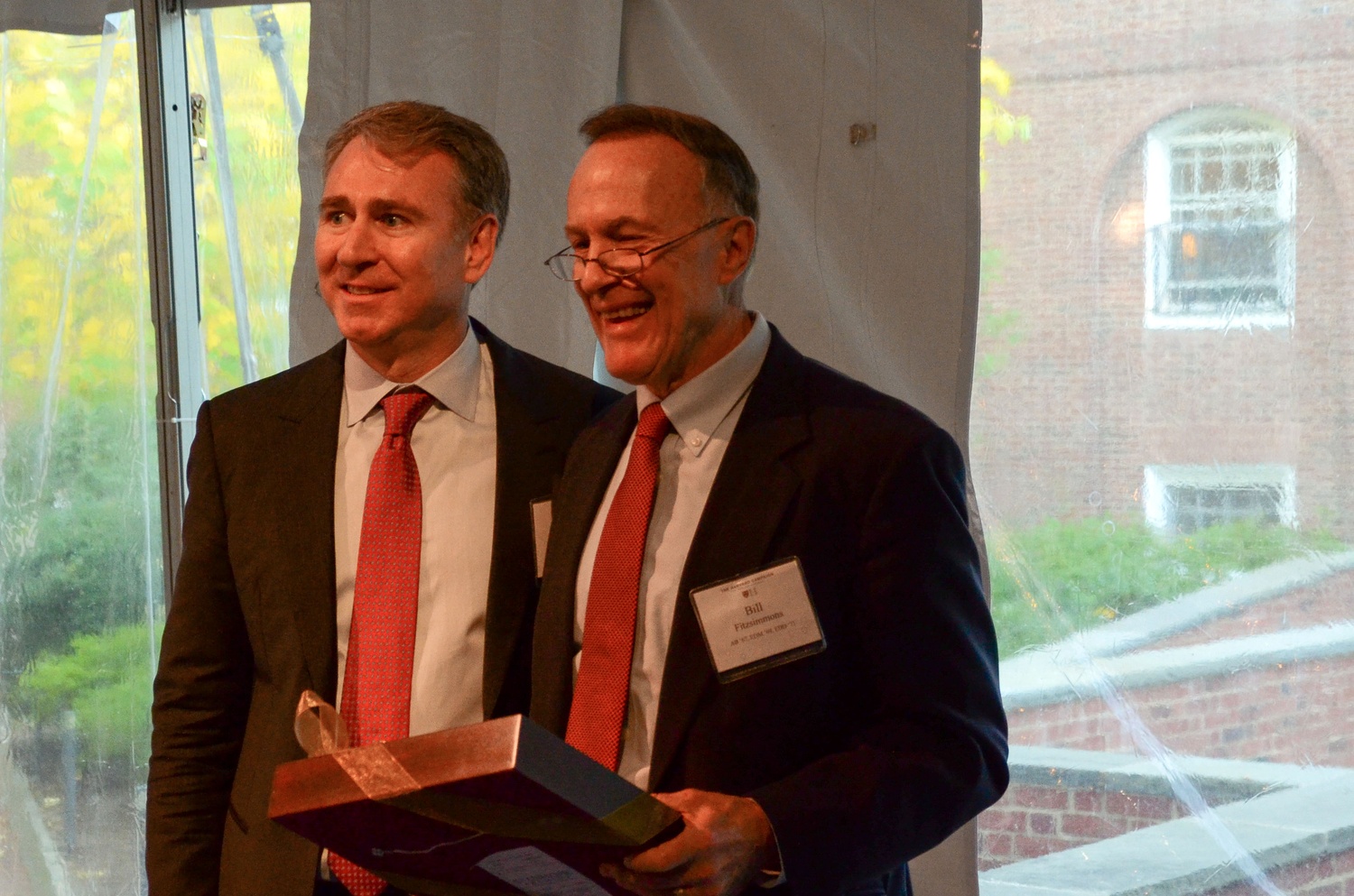 Kenneth C. Griffin '89, left, and William R. Fitzsimmons '67 address the attendees on Thursday afternoon during the dedication of the Office of Financial Aid.  