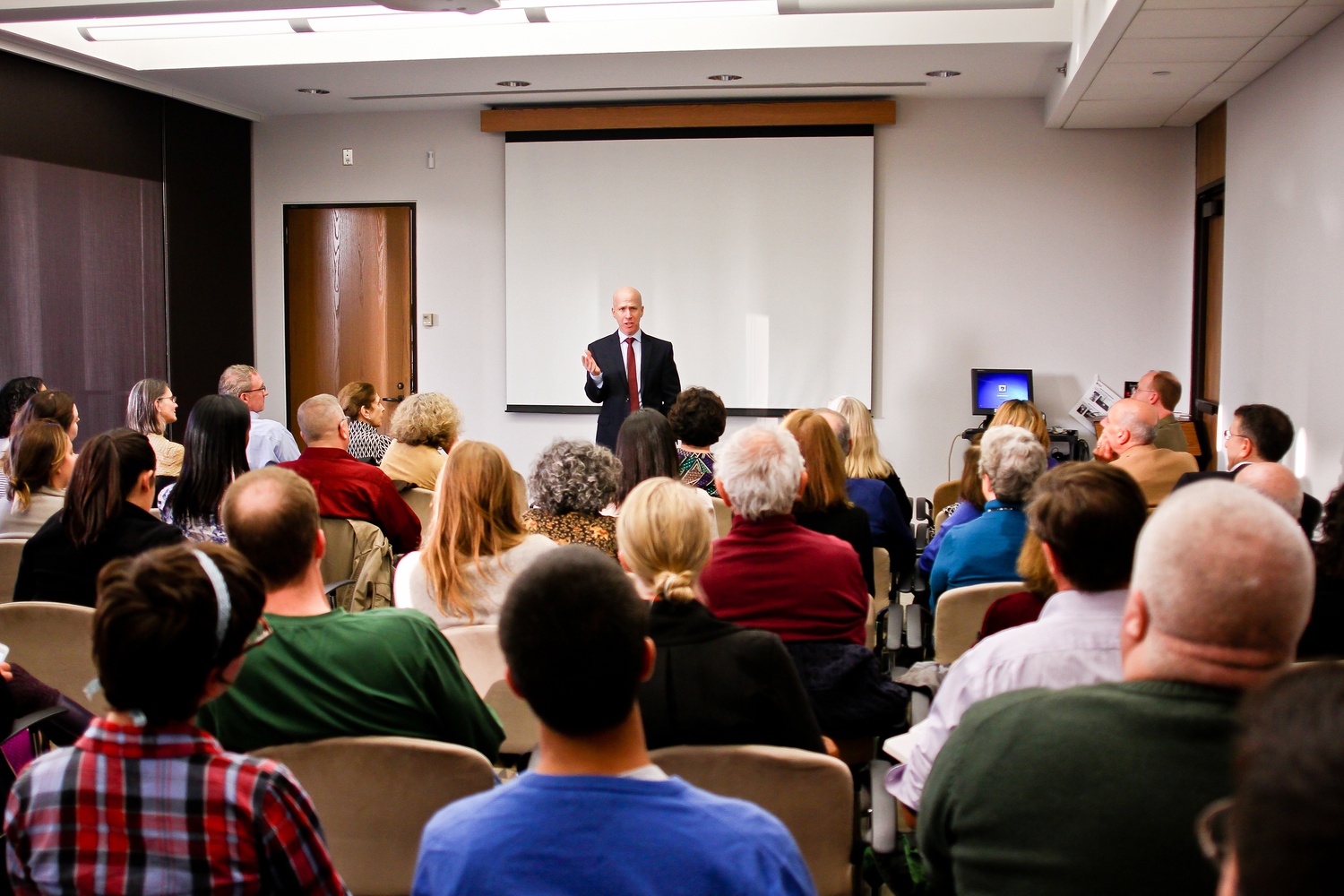 New York Times best-selling author Jonathan Eig addresses the crowd about history of birth control pills during a discussion for his new book, "The Birth of the Pill," at the Countway Medical Library of Harvard Medical School on Tuesday afternoon.