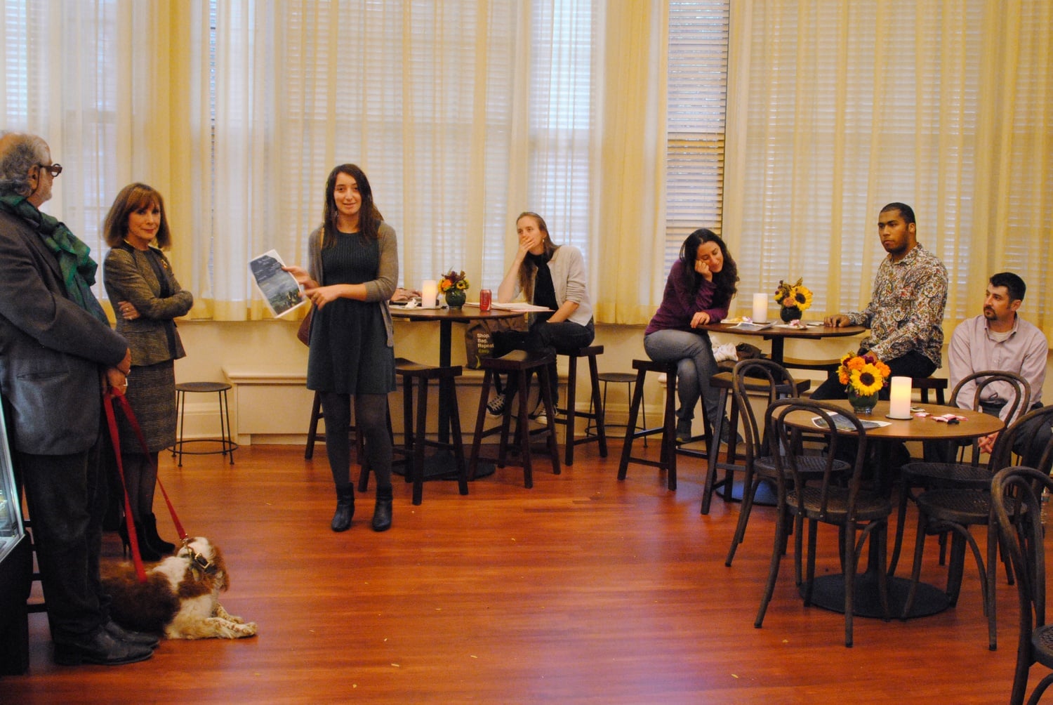 Liz Maynes-AminZade, a lecturer in History and Literature, welcomes community members to the grand opening of the Barker Center Cafe.