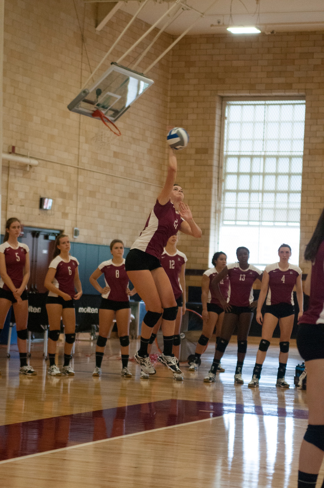The Harvard women's volleyball team, shown here in earlier action, downed Dartmouth in straight sets on Friday night.