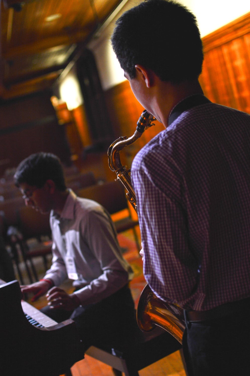 A jazz performance marks the end of the Friday session for the Harvard Asian American Alumni Summit. 