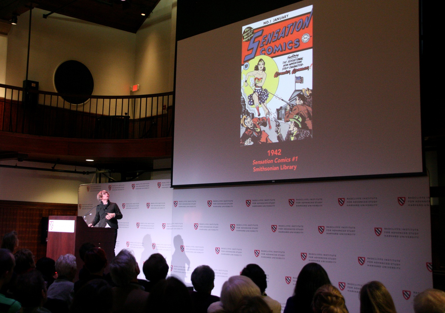 Jill Lepore, David Woods Kemper ’41 Professor of American History, looks up at her presentation, titled "How Wonder Woman Got into Harvard". Lepore's lecture at the Knafel Center accompanied the recent release of her newest book, titled "The Secret History of Wonder Woman."