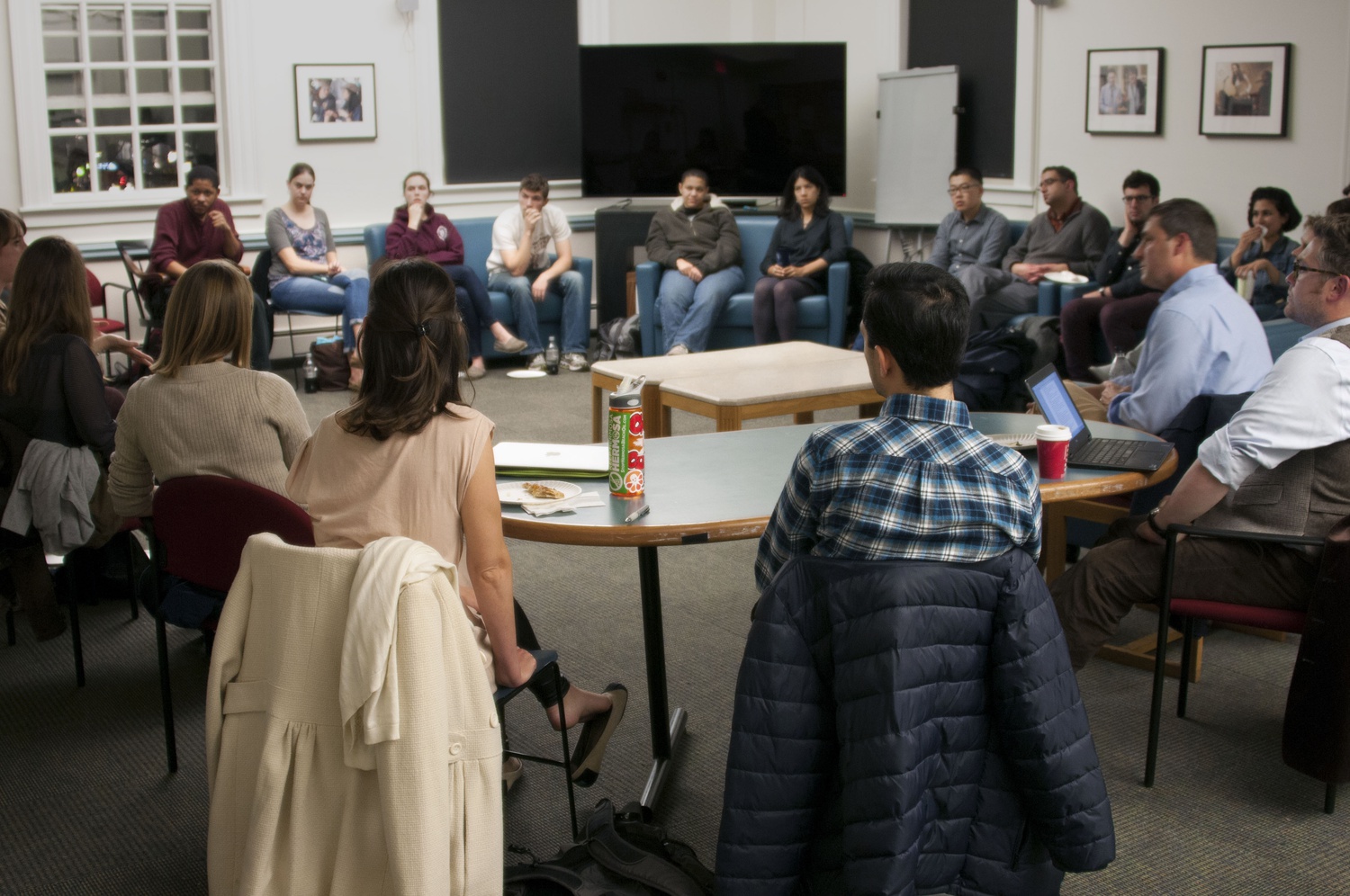 Graduate student TFs hold a town hall meeting in Dudley House to discuss the General Education Program Wednesday evening.
