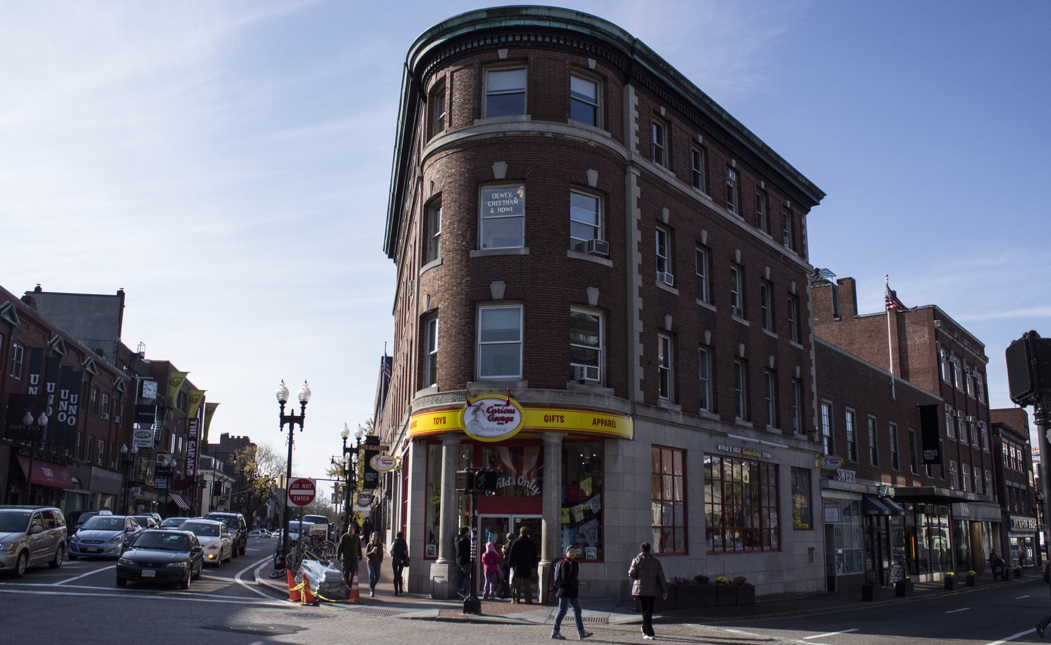 The fictional firm Dewey, Cheetham, & Howe is located above the Curious George store on the corner of JFK and Brattle Streets.