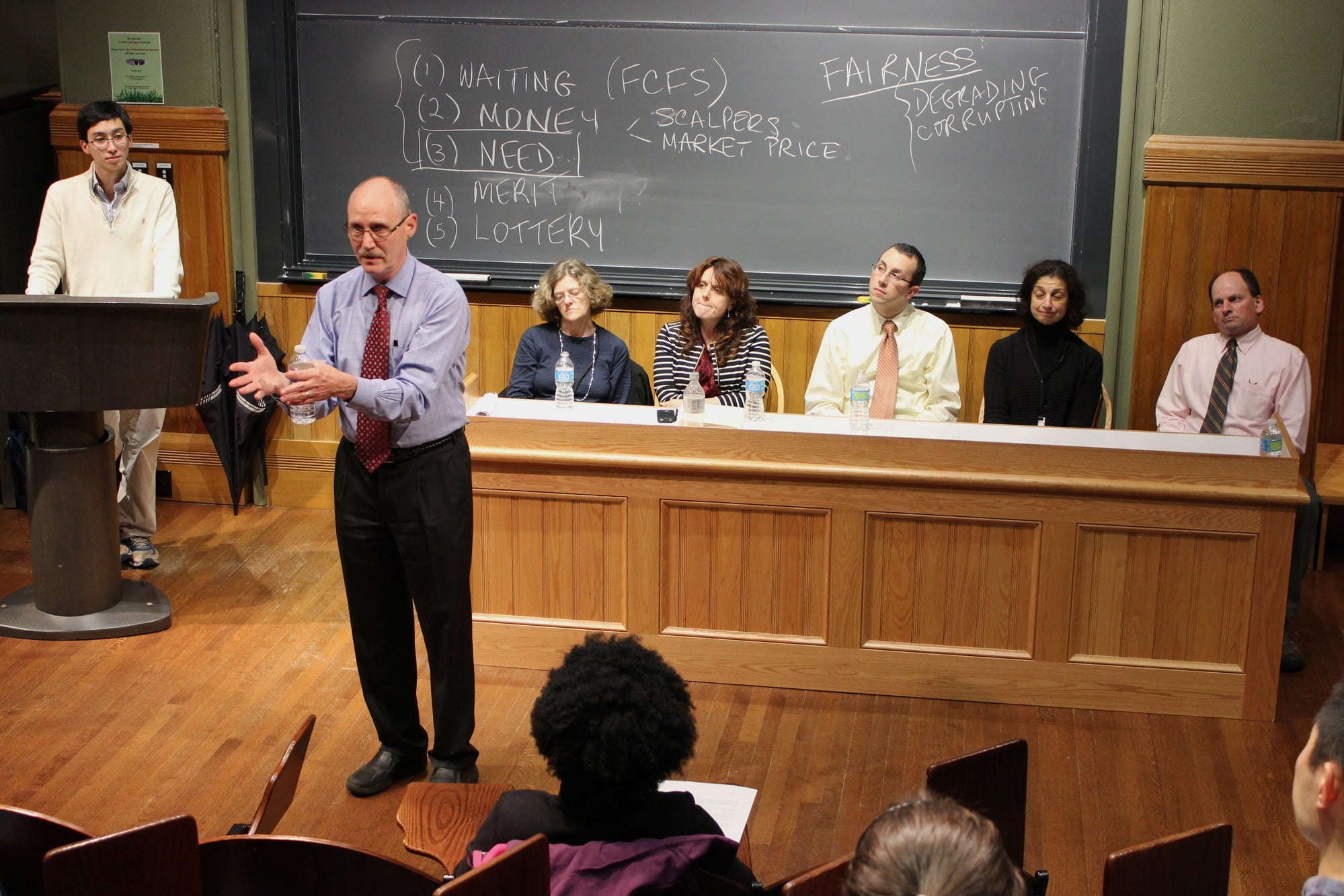 Dr. Paul Barreira, director of Harvard University Health Services, provides a brief overview of HUHS's intention to alter overnight services at last night's town hall, organized by the UC and Harvard HealthPals.