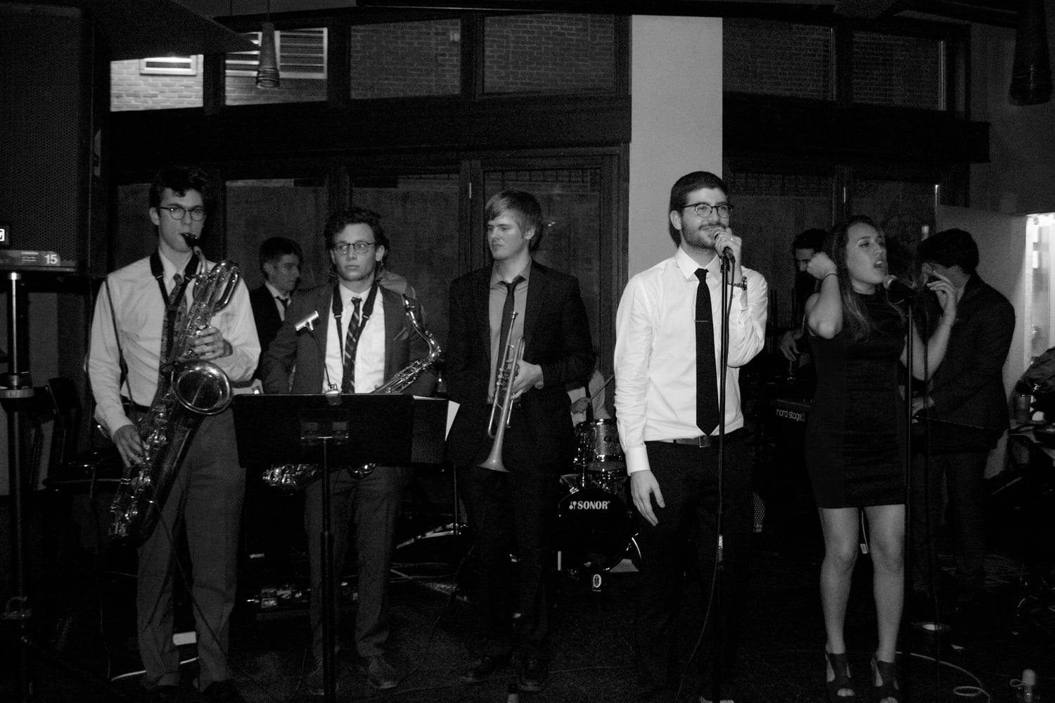 The Intrinsics performing at Fire and Ice. Left to right: John B. Tournas '16, Alex S. Graff '17 (behind), Ben L. Sobel '15, active Crimson Arts Executive Tree A. Palmedo '16, Jeremy Sabath '16, Nadia L. Urrea '17, and Ethan I. Simon '16 (behind). 