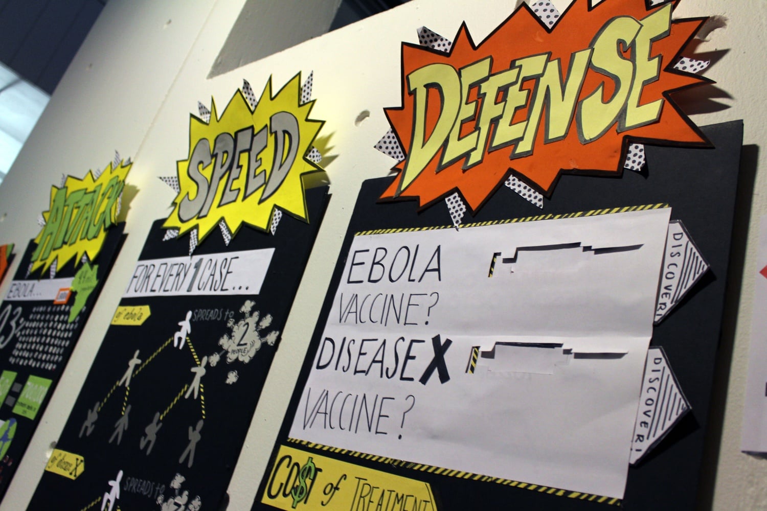 The Emerging Epidemics Art Exhibit presented by The Harvard Undergraduate Global Health Forum sits in The Science Center on Wednesday. The exhibit compares the Ebola virus to a more common, but deadly Disease X. 