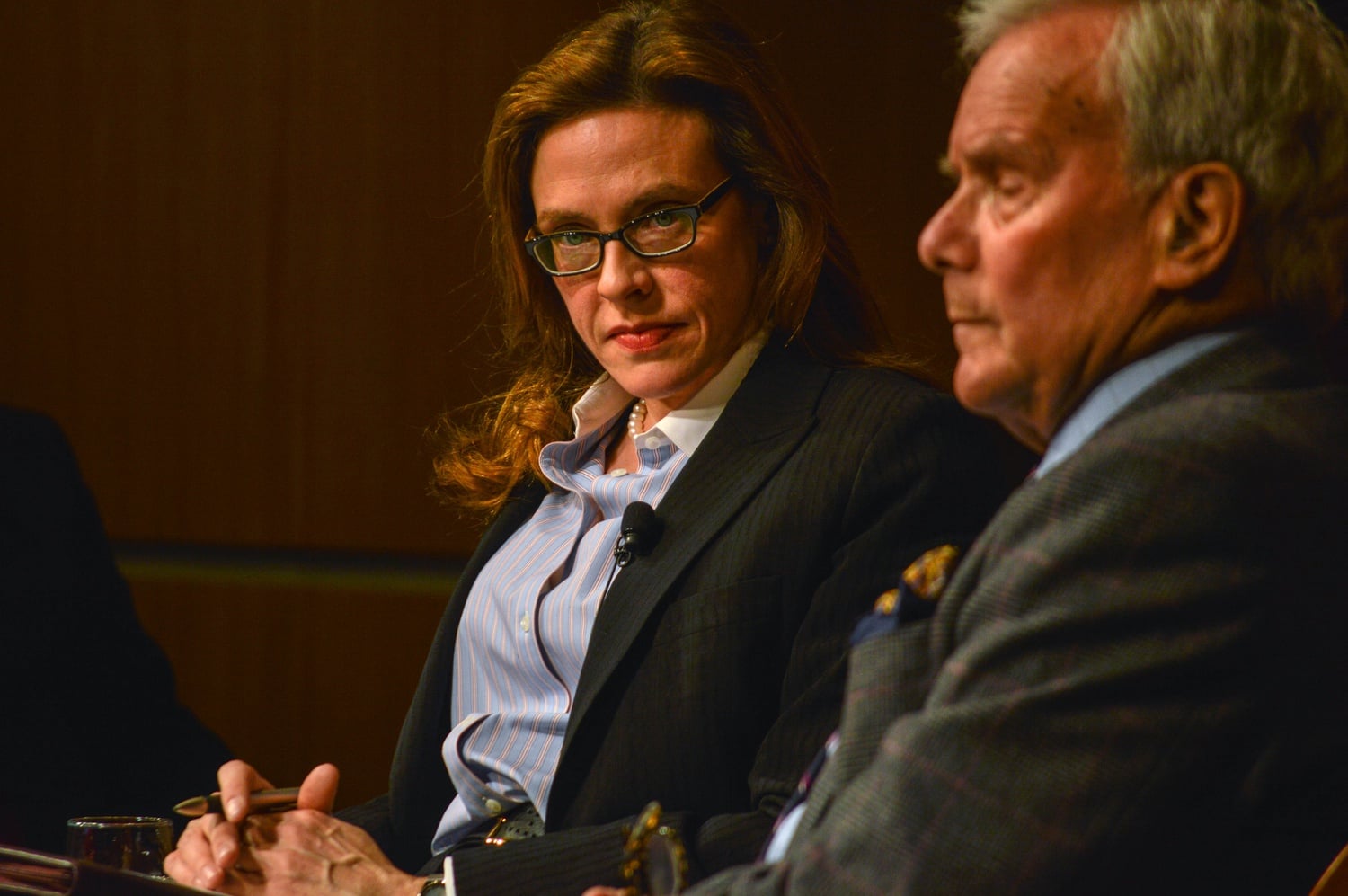 Harvard visiting professor Mary E. Sarotte stares into the crowd as former managing editor of NBC Nightly News Tom Brokaw speaks about his experiences at the 1989 Berlin Wall. The discussion took place at a crowded Institute of Politics on Tuesday evening.
