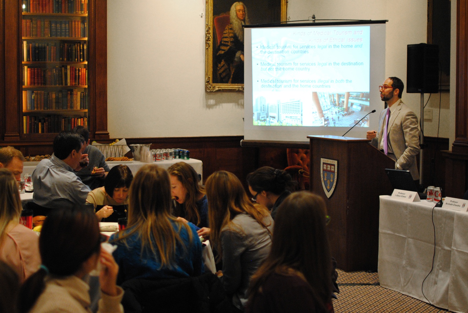 Professor of Law and Faculty Director of the Petrie-Flom Center, I. Glen Cohen leads a talk about his book 'Patients With Passports: Medical Tourism, Law, and Ethics' in Langdell Hall on Wednesday. Panelists for the discussion included Amitabh Chadra, Nir Eyal, and Alicia Ely Yamin. 