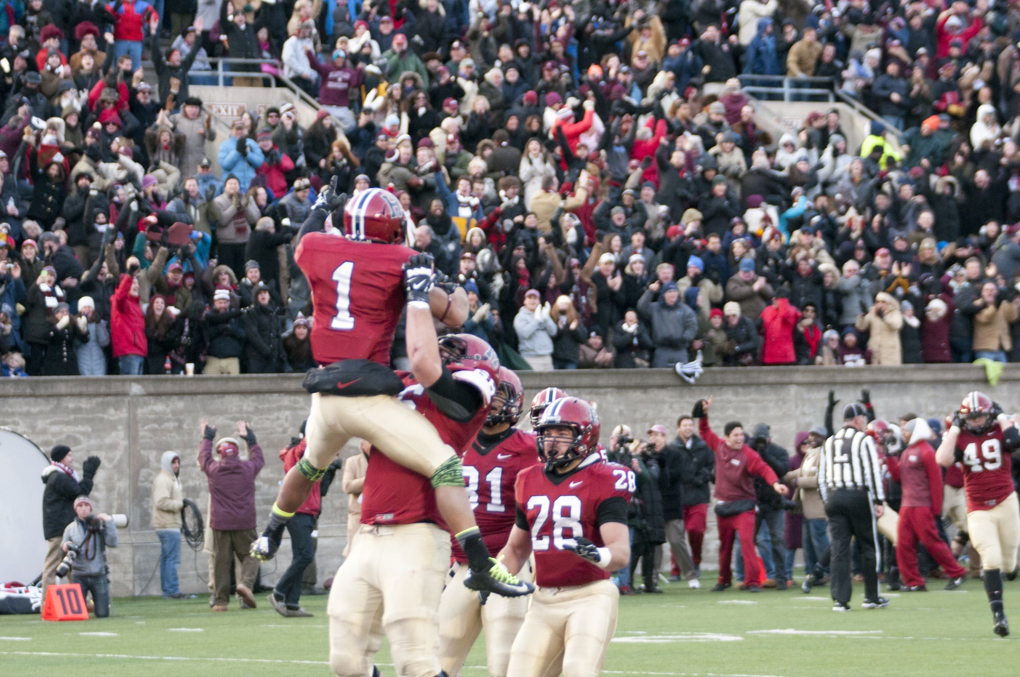 Junior wideout Andrew Fischer celebrates after scoring the game-winning touchdown. 