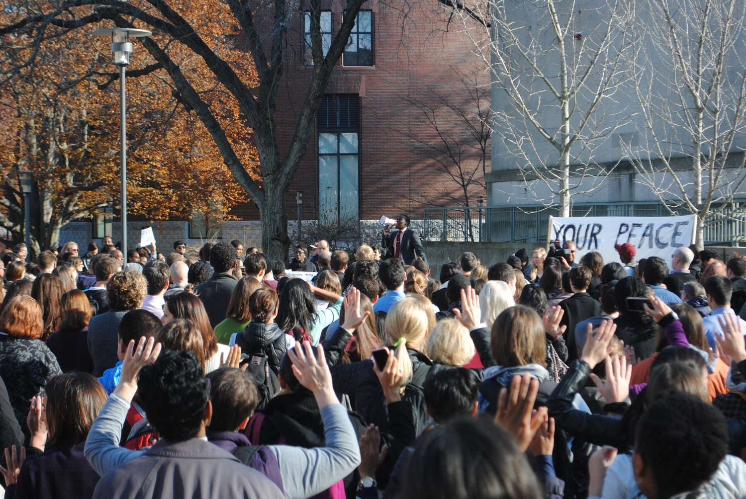 Students from the Graduate School of Education marched from Gutman Hall to Harvard Law School in protest of the Ferguson verdict, at one point blocking traffic, on Monday. Protesters chanted phrases including, "Hands up, don't shoot" and listened to various speakers.  