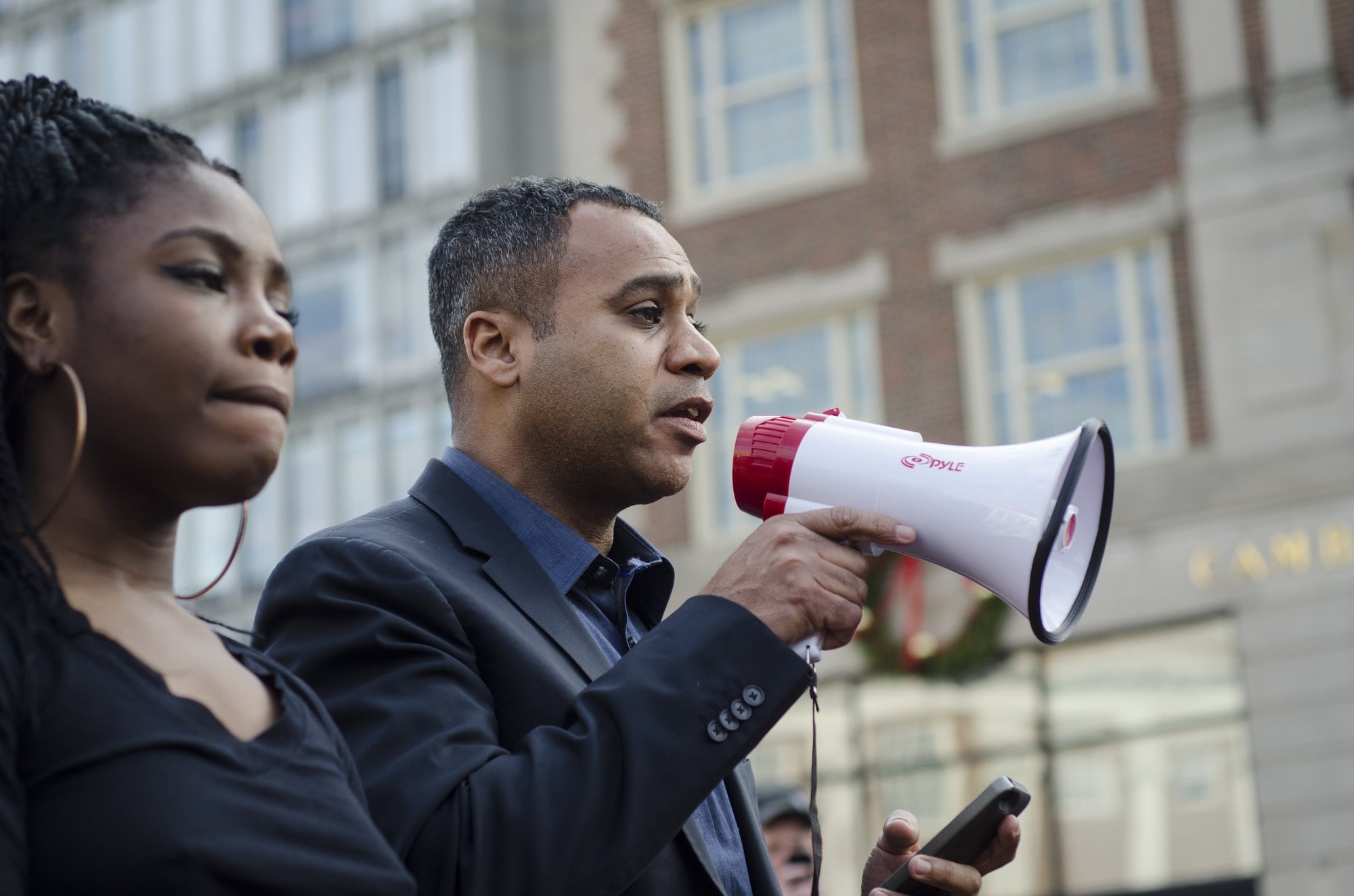 Dennis Benzan, vice mayor of Cambridge, spoke to protesting students from Cambridge Ringe and Latin School on Monday afternoon, standing in support of their school walk-out.