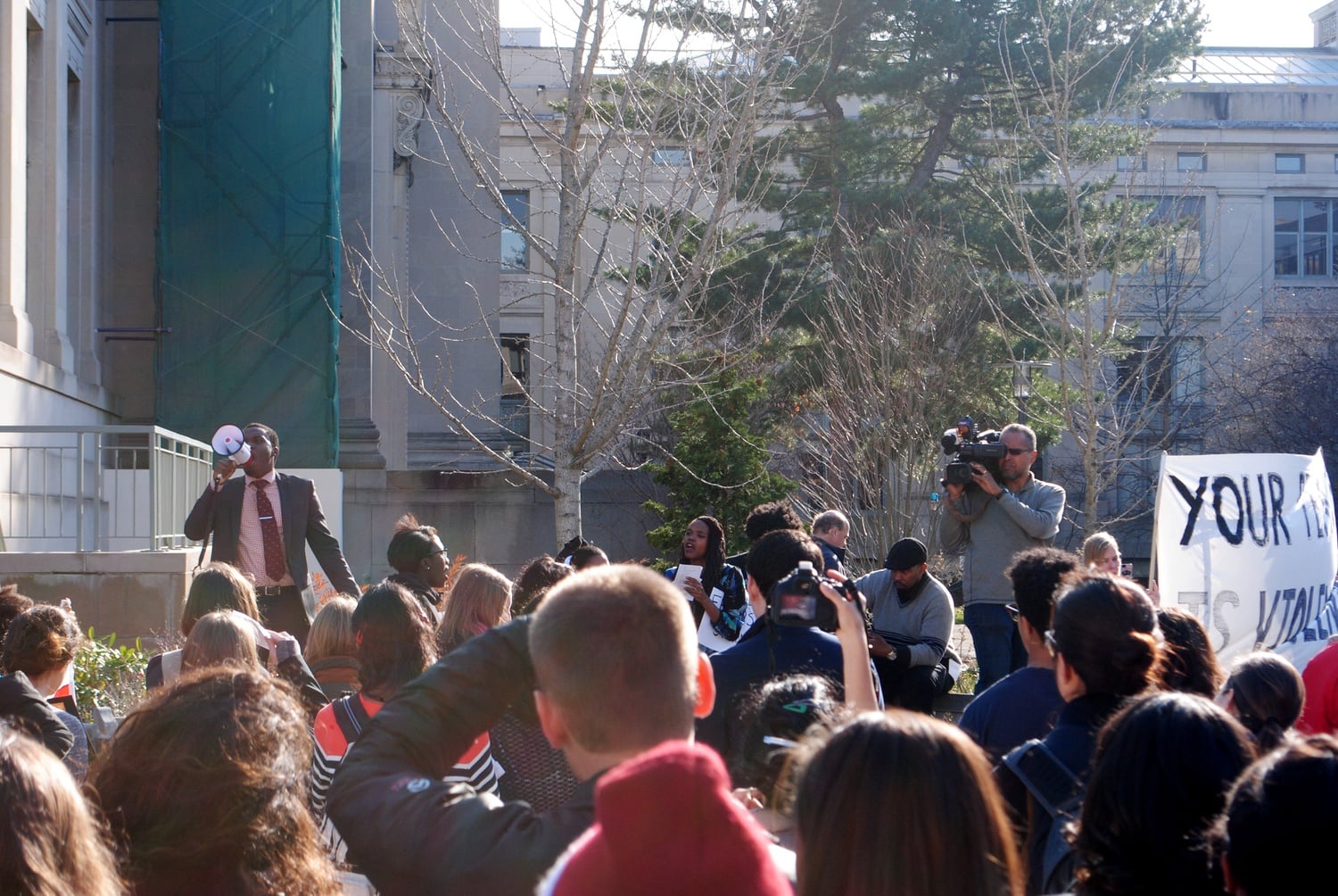 Protesters gathered from the Graduate School of Education and the Law School on Monday at noon in peaceful yet vocal demonstration of solidarity with Ferguson, Mo.