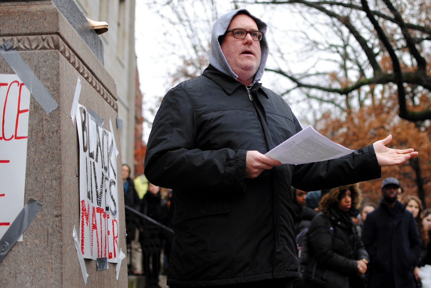 Harvard Kennedy School lecturer Timothy P. McCarthy '93, gives a speech arguing that "black lives have never mattered as much as white lives have" at a protest Wednesday morning outside University Hall.