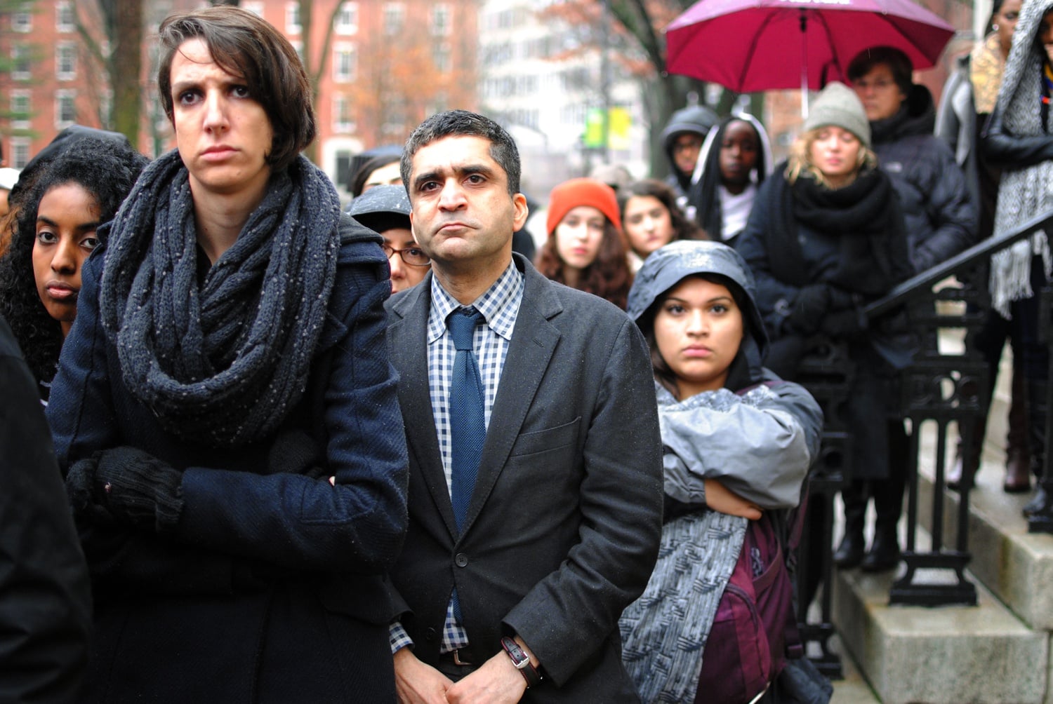 Dean of Harvard College Rakesh Khurana stands among members of the Harvard community at a protest in December outside University Hall in 2014.