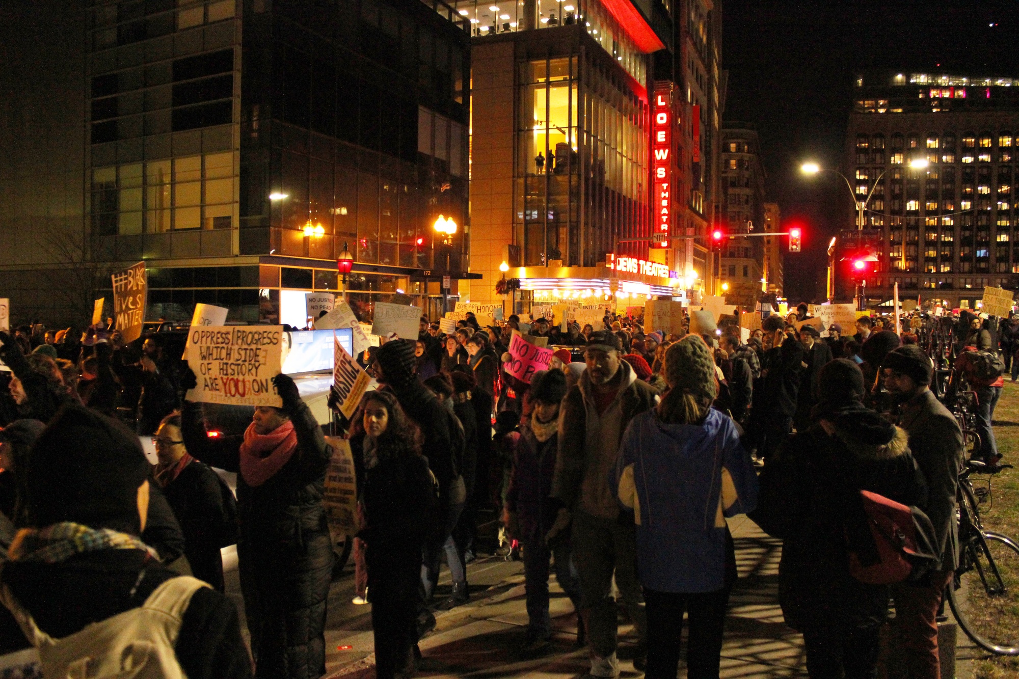 Protestors march on Tremont Street.