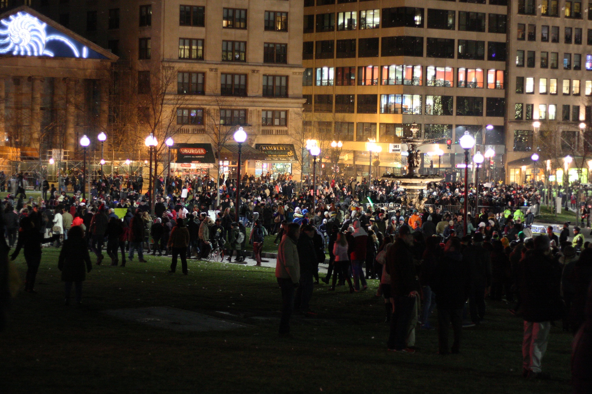 Thousands gather in Boston Common to protest the Eric Garner case at the city's tree lighting ceremony.