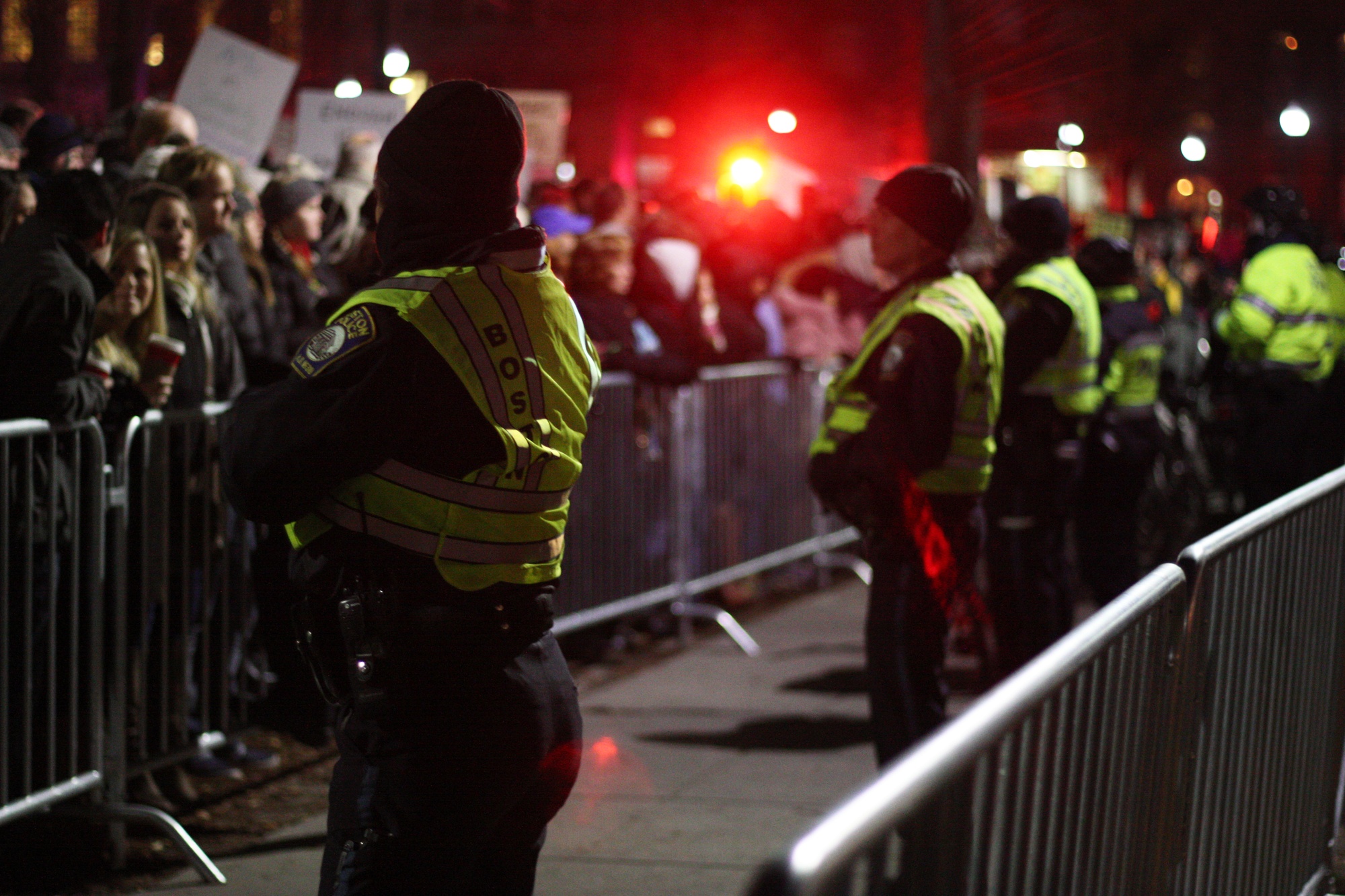 Police officers stand guard to maintain crowd control at the tree lighting ceremony on Thursday evening.