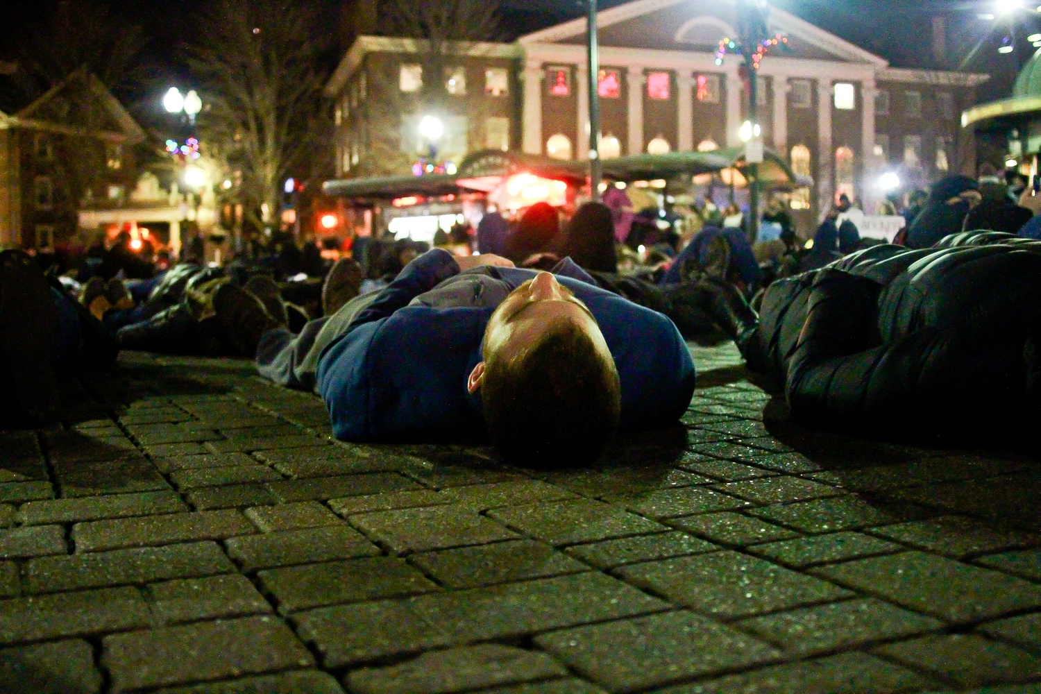 A protestor at the die-in in Harvard Square on Friday evening.