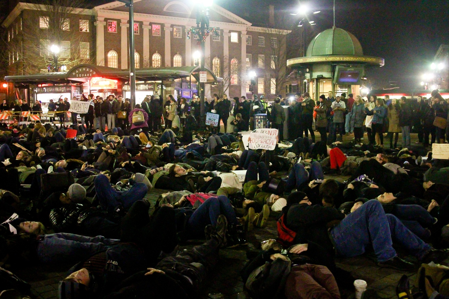 Protestors at the die-in in Harvard Square on Friday evening.