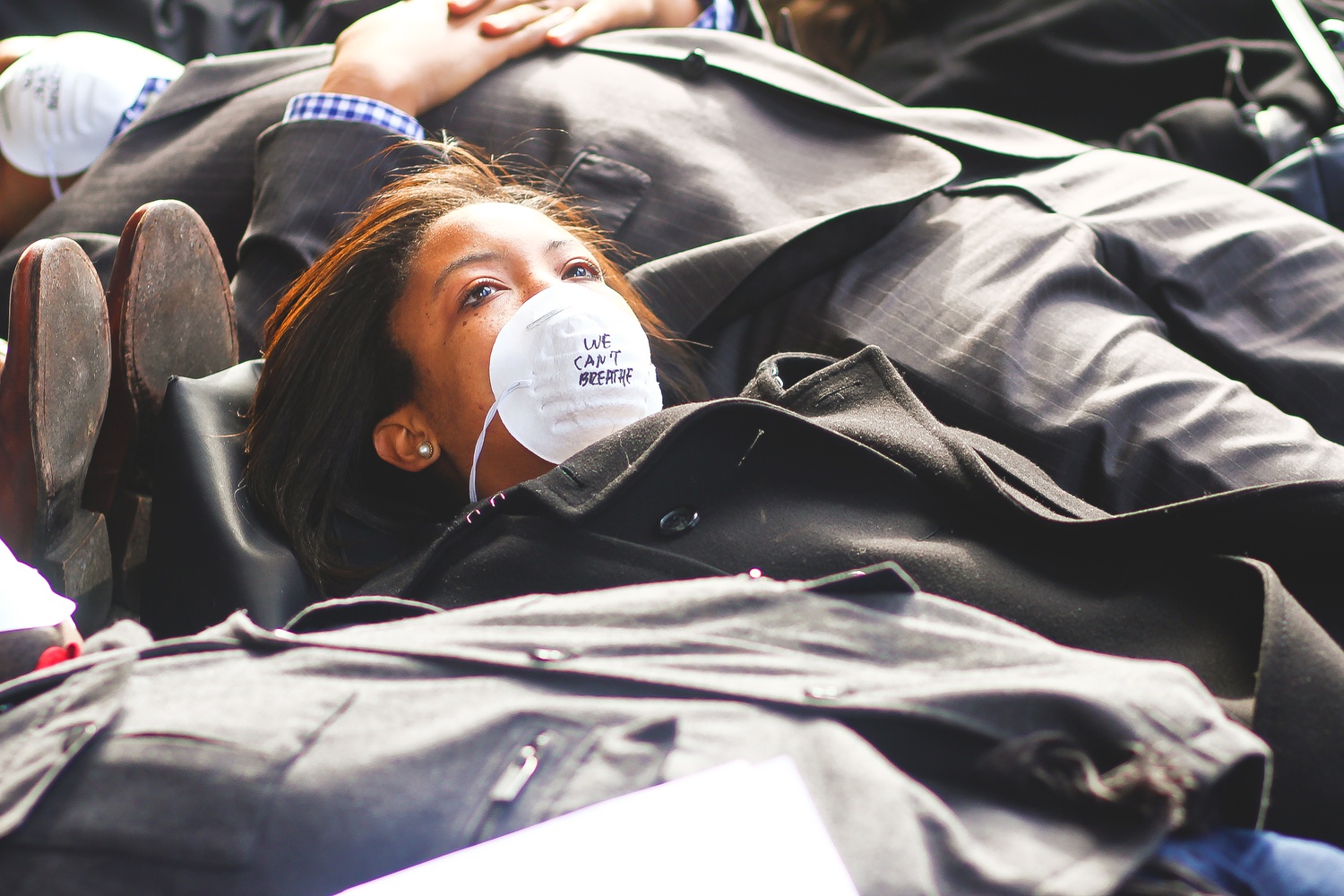 Attendees participate in a die-in event on Sunday afternoon outside of Memorial Church.