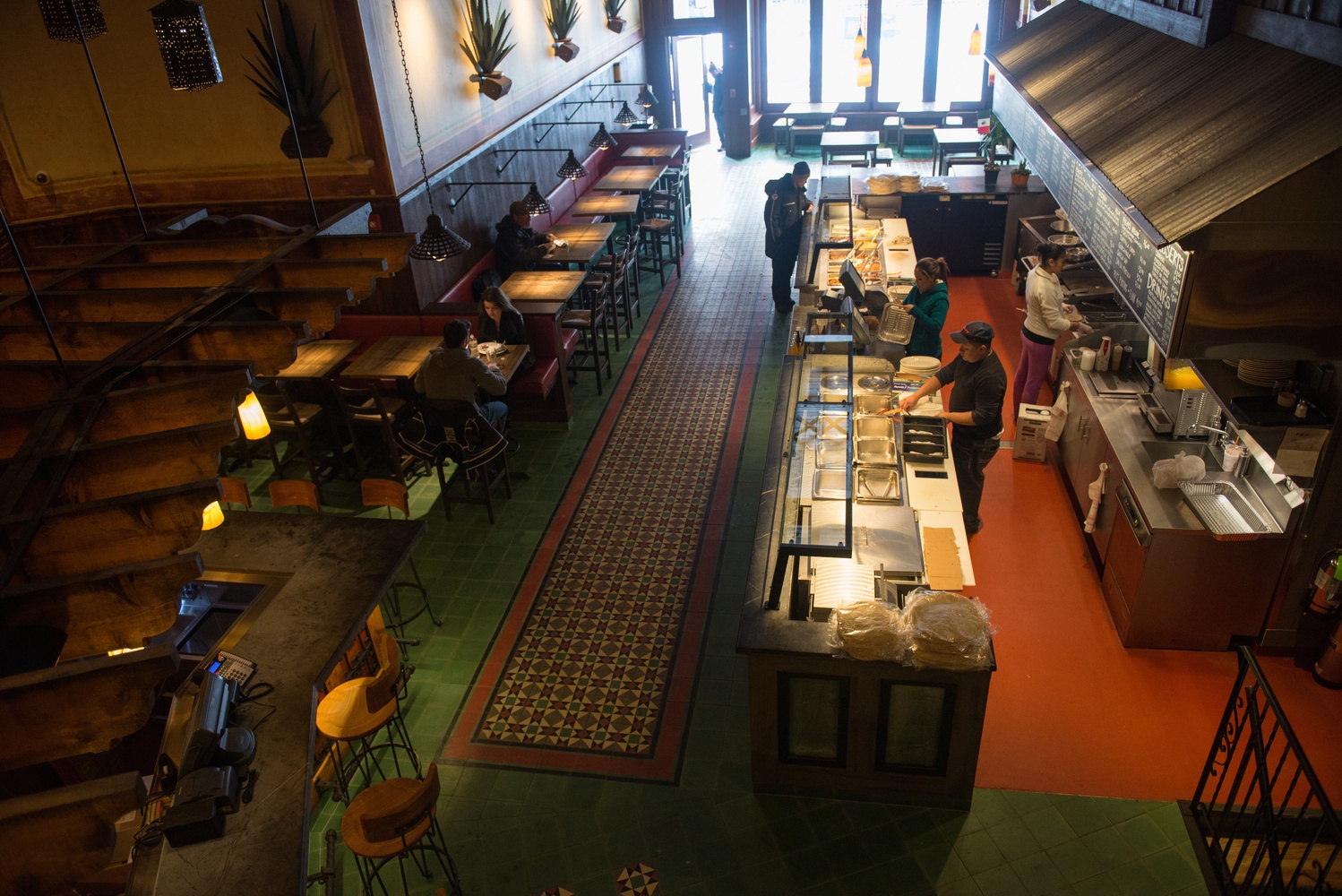 The new interior of Felipe's Taqueria features two levels of seating and a bar.