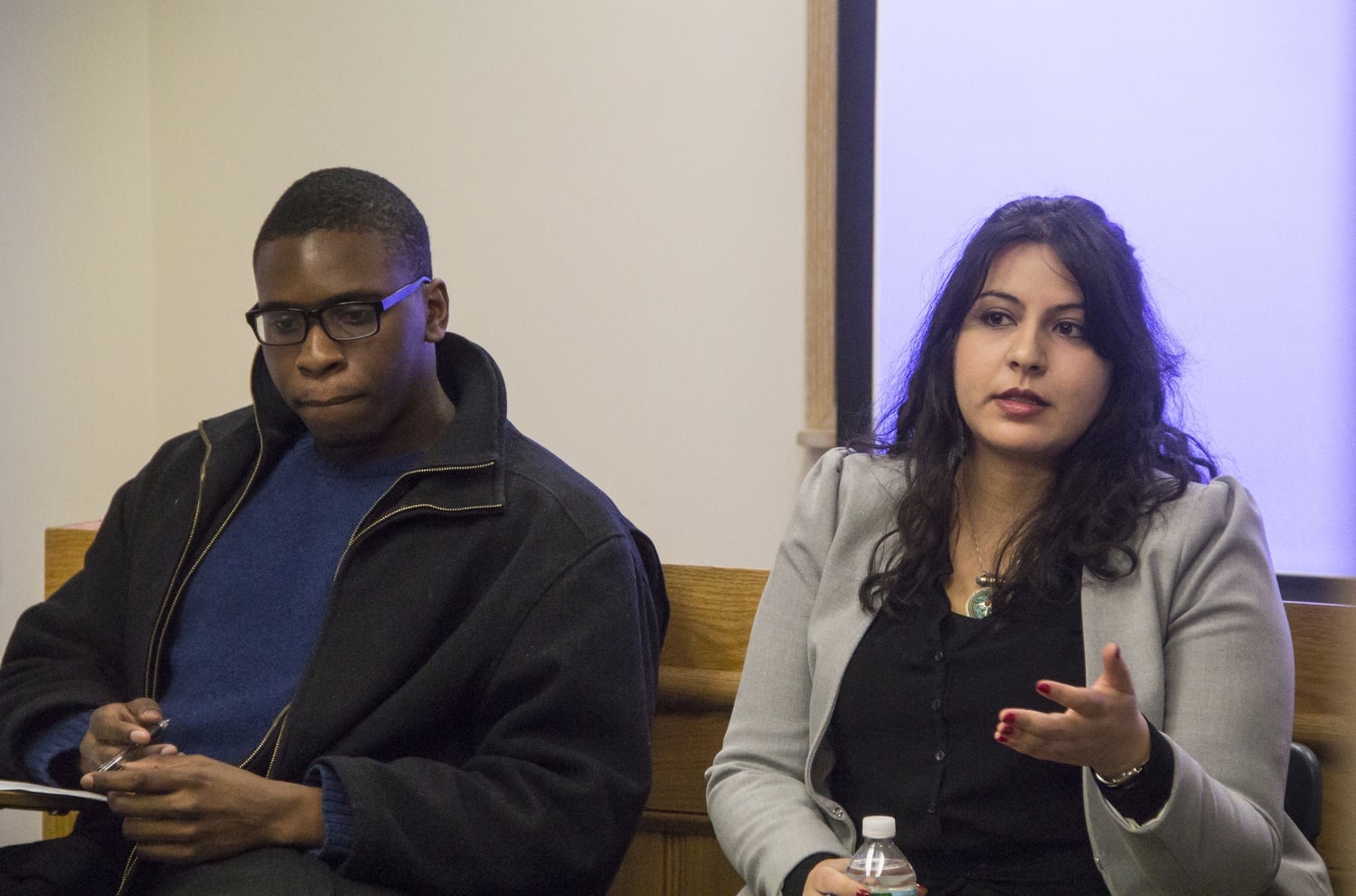 Temitope A. Agabalogun ’15, left, and Nashwa Gewaily, a legal fellow at the Massachusetts ACLU, discuss the aftermath and consequences of the non-indictments of the police officers responsible for the deaths of Michael Brown and Eric Garner last year. 

