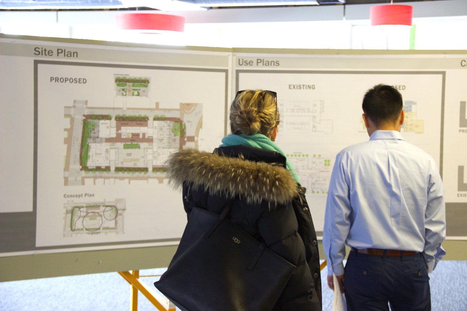 Visitors examine initial renderings of renovation plans to the Smith Campus Center. The University held a public open house event Wednesday to showcase the proposed changes.