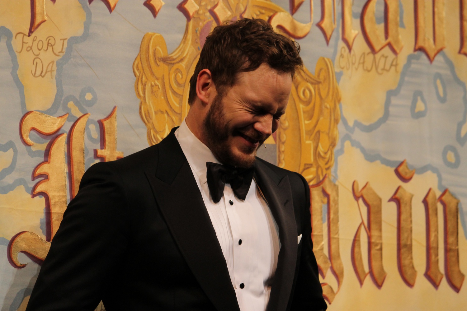 Chris Pratt, Hasty Pudding Theatricals' Man of the Year, appreciates a joke at his roast on Friday evening in Farkas Hall. 