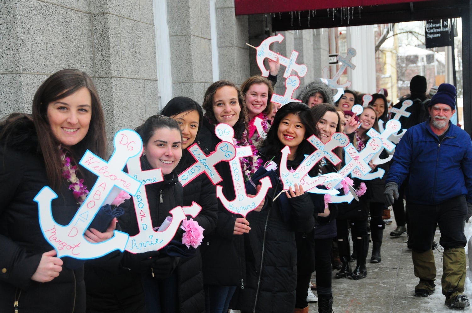 Older members of sorority Delta Gamma wait outside the Sheraton Commander Hotel Tuesday afternoon while the new members receive their bids inside.
