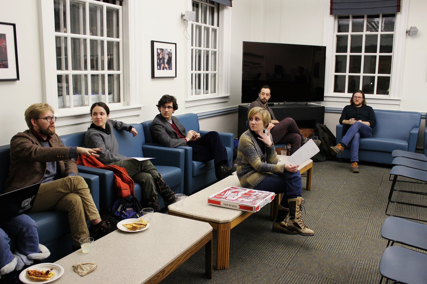 Graduate Student Council President Summer A. Shafer leads the council's first meeting of the year in Dudley House on Wednesday evening. Many criticized the size of sections, noting that teaching fellows were additionally struggling with logistics after recent snow days.