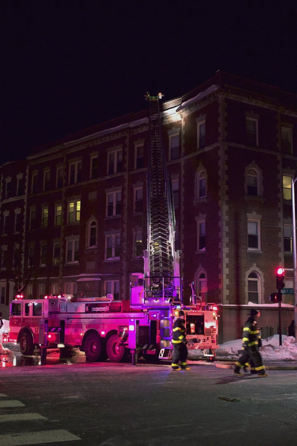 Firefighters attempt to subdue a fire on Massachusetts Avenue on Wednesday night. All tenants of the building evacuated safely and there were no reported injuries.