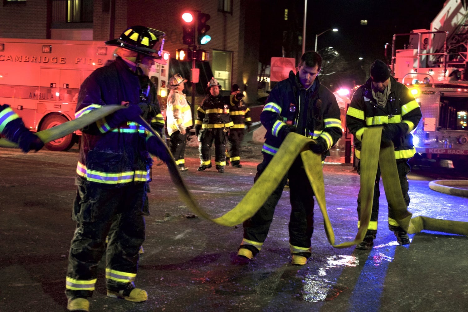 Firefighters attempt to subdue a fire on Massachusetts Avenue on Wednesday night. All tenants of the building evacuated safely and there were no reported injuries.