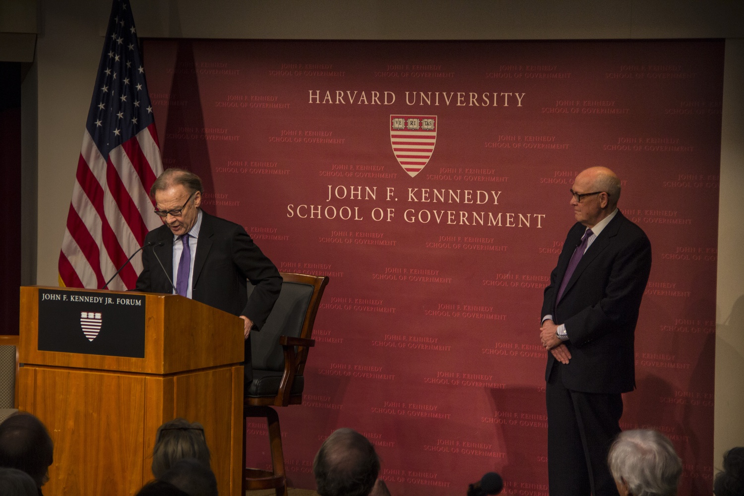 Professor of Government Thomas E. Patterson, left, presents the Goldsmith Book Prizes for best academic and trade book as Alex S. Jones, right, looks on.

